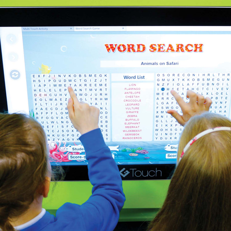image of two young female school children playing word search on the 43 inch G-Touch Table