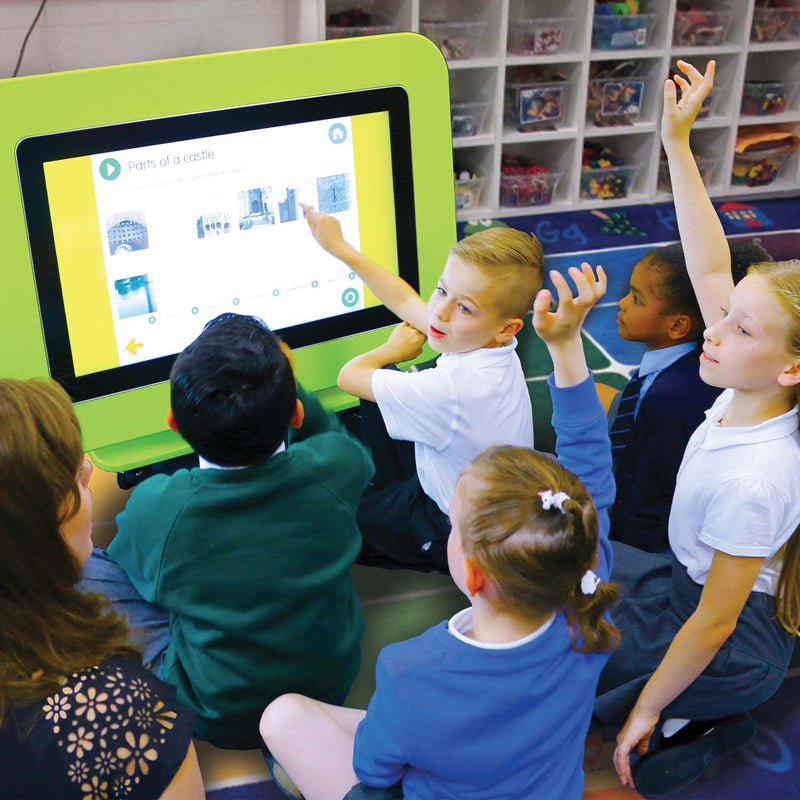 image of group of school children with hands raised, answering a question from the 43 inch G-Touch Table